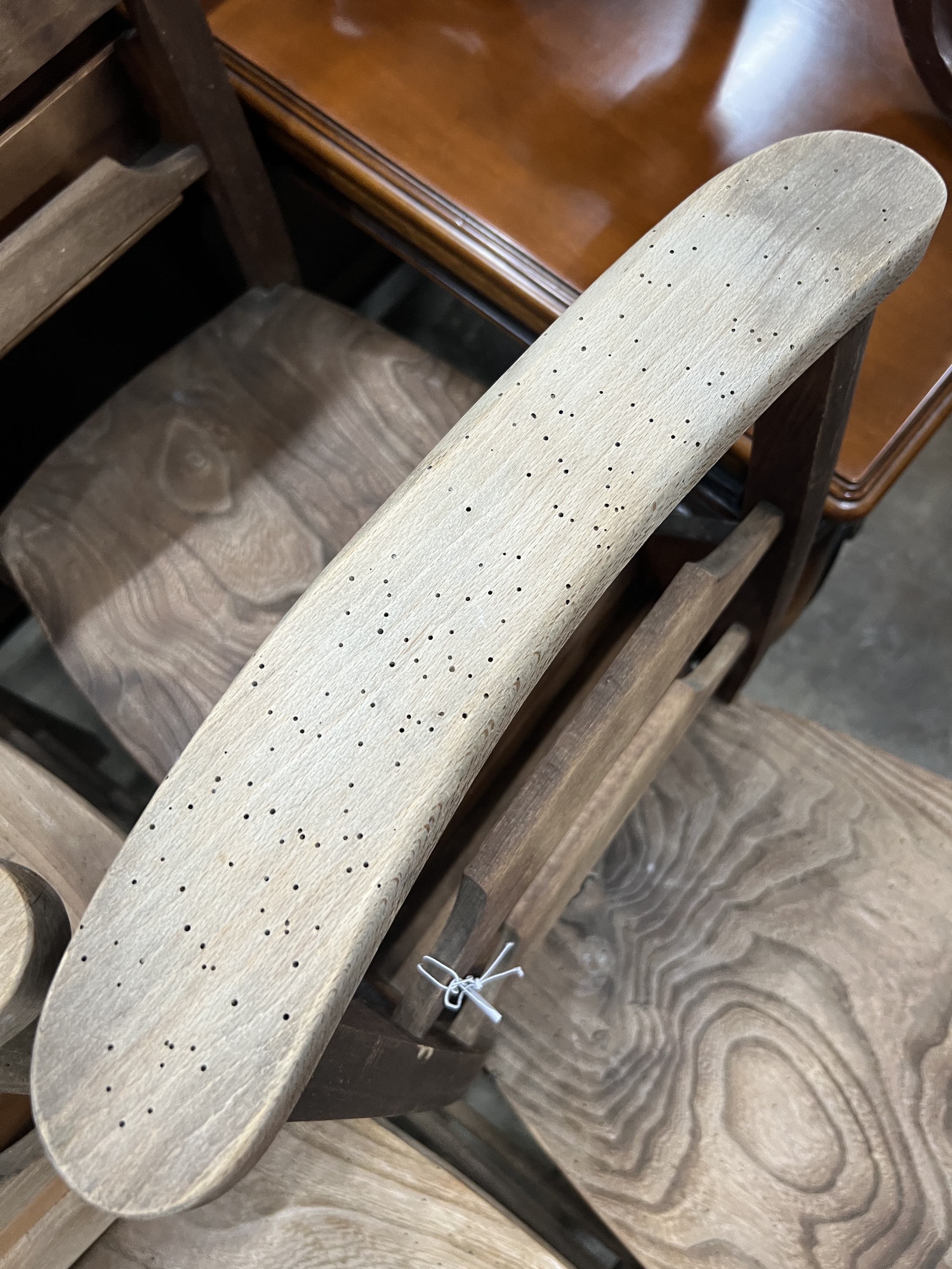 A set of ten elm and beech chapel chairs